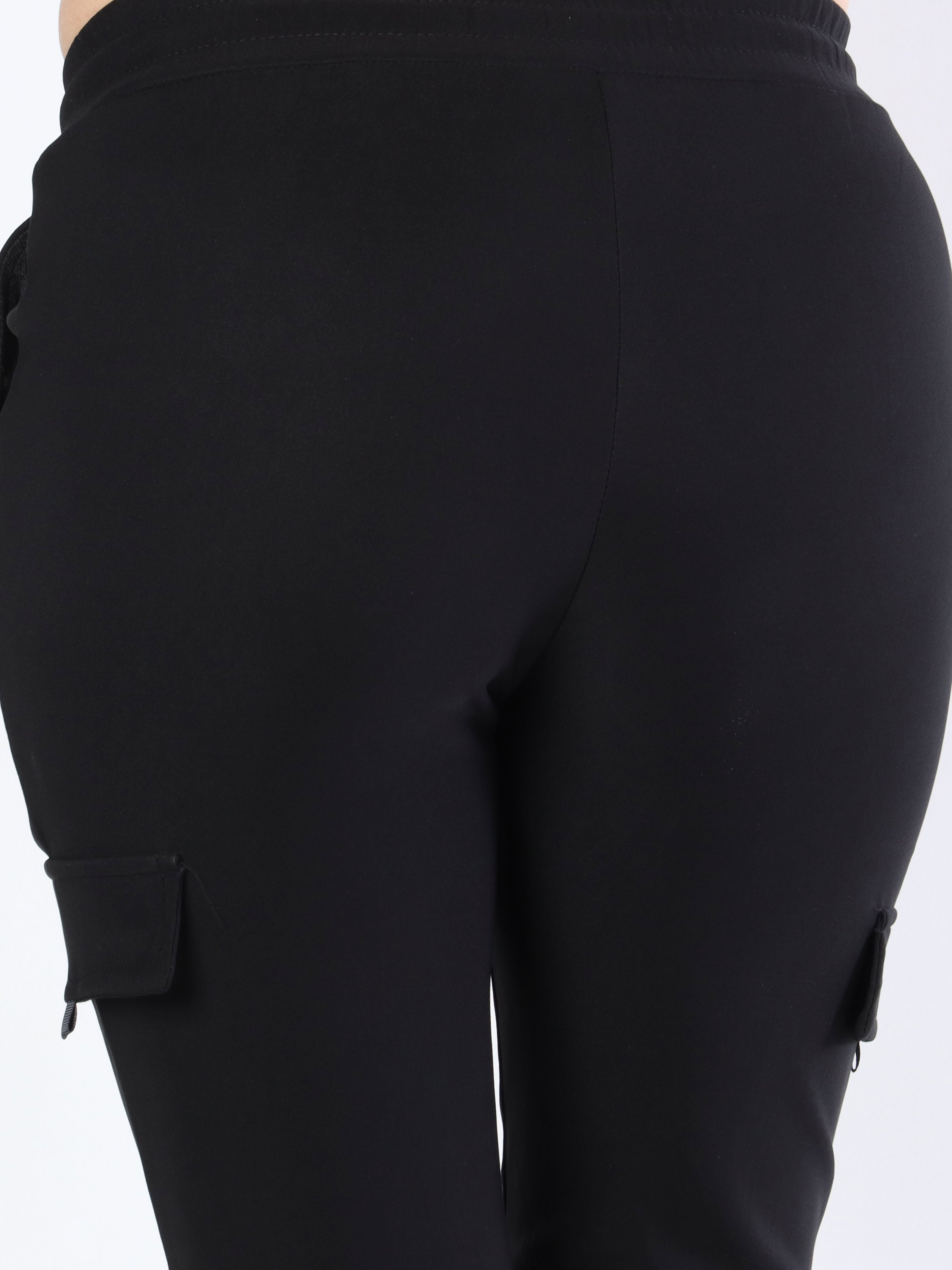 Antonia - Sorte elastiske bukser med lommer på benene